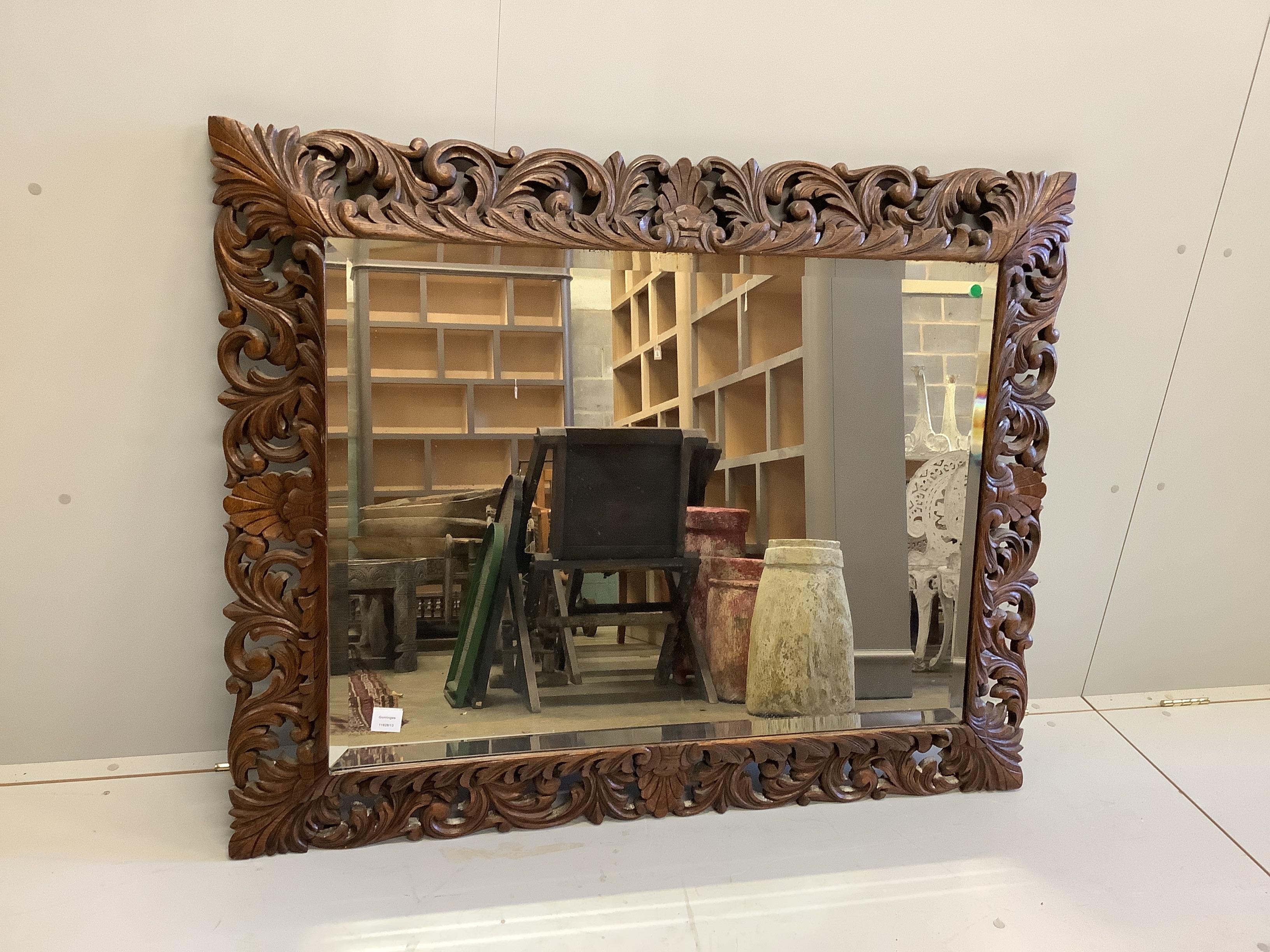 A Victorian carved oak wall mirror, width 128cm, height 103cm